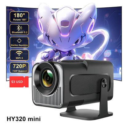 HY320 mini projector displaying a futuristic character on a large screen. The projector supports 720P resolution, WiFi 6, Bluetooth 5.2, and features a 180° rotation with an electric keystone adjustment.